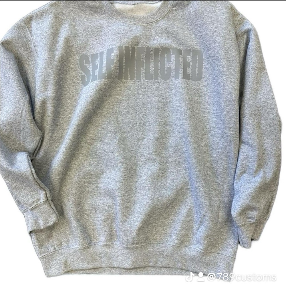 SELF INFLICTED Crewneck